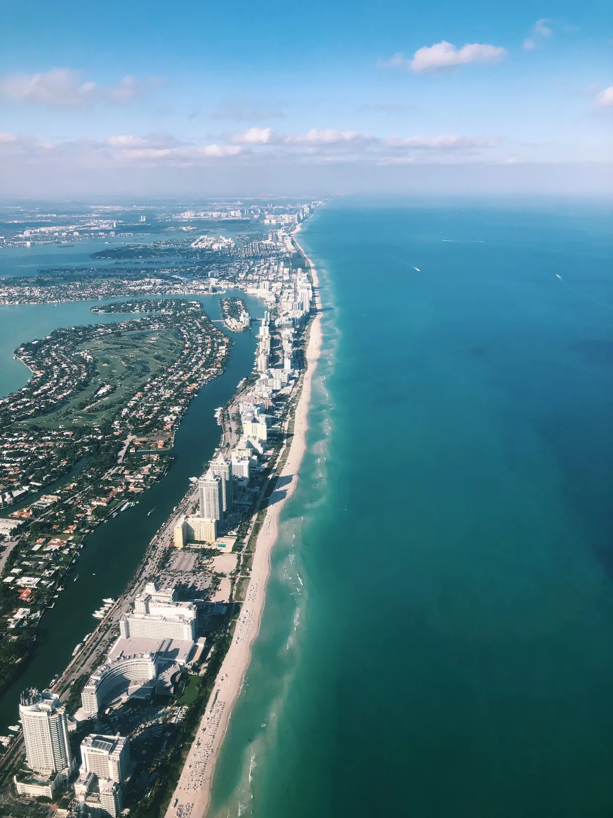 Aerial view of Miami Beach coastline and turquoise Atlantic Ocean