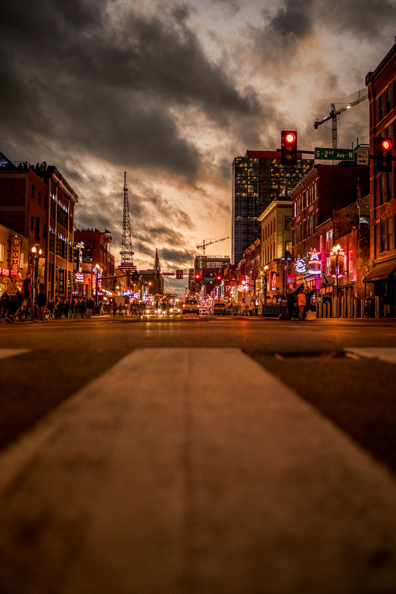Lower Broadway Nashville at night with neon honky-tonk signs