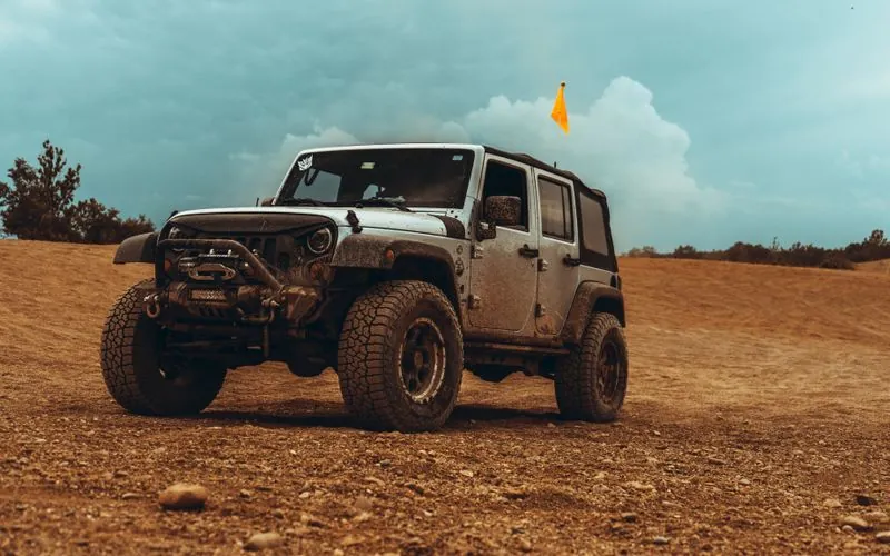 Off-road 4x4 Jeep on a rugged dirt trail